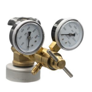 Dual gauge brass regulator with adjustment knob and pressure gauges.