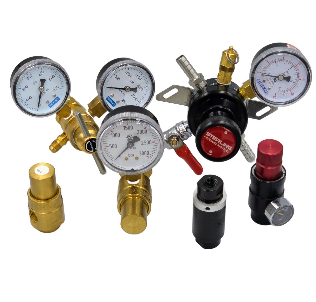 Various pressure gauges and regulators with brass fittings.